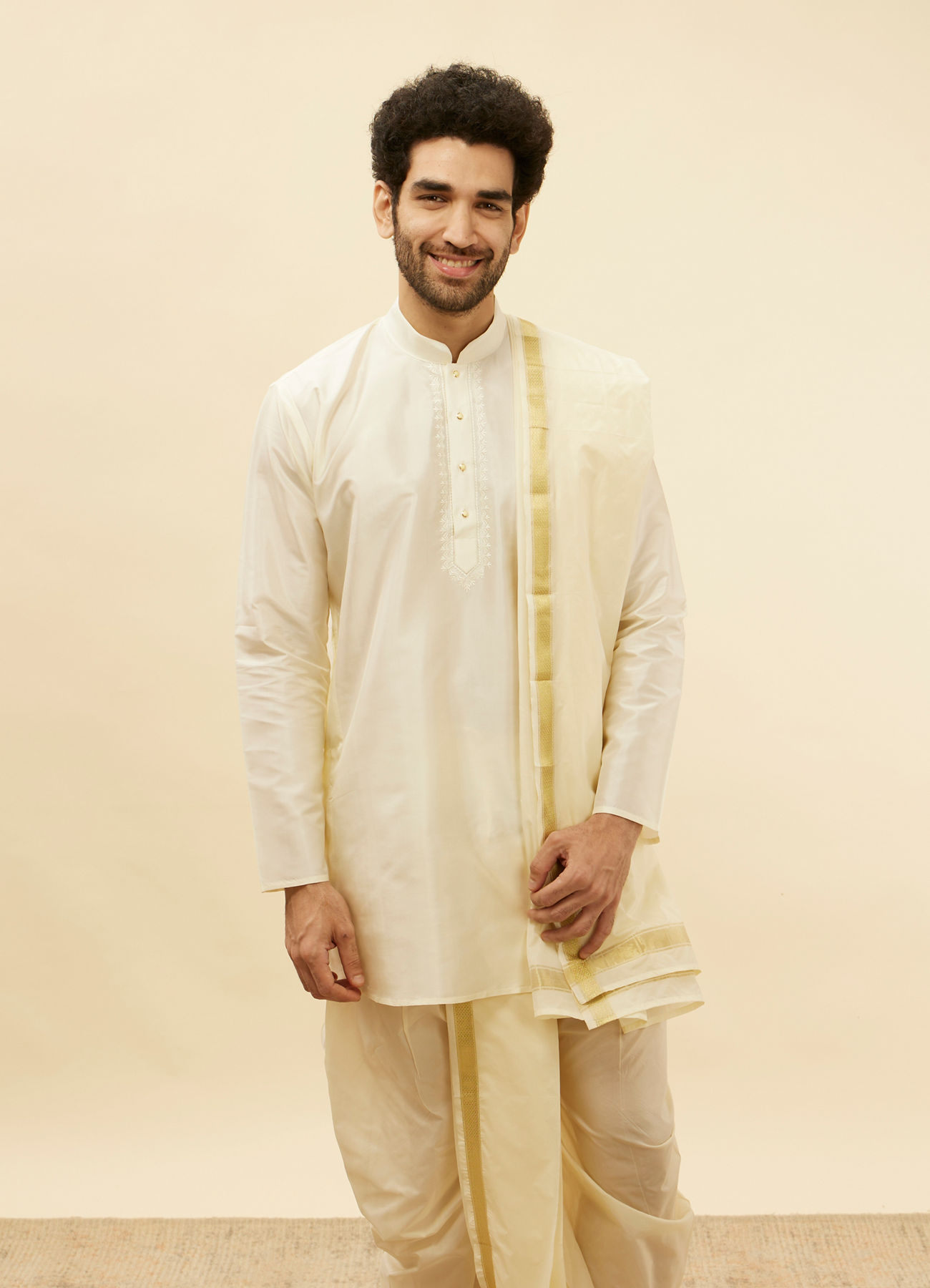 alt message - Manyavar Men Warm White Zari Bordered Traditional South Indian Pancha Set image number 0