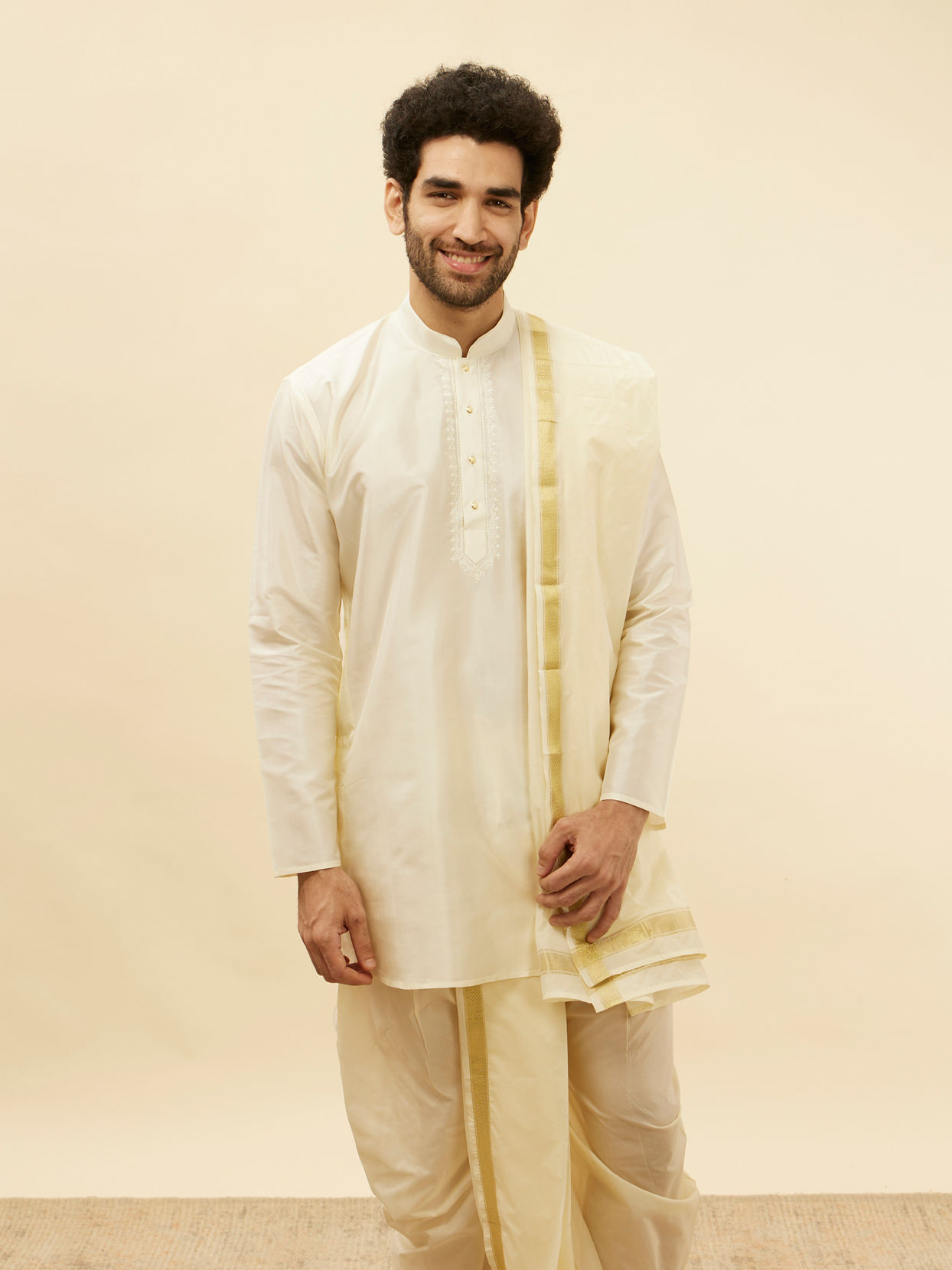 alt message - Manyavar Men Warm White Zari Bordered Traditional South Indian Pancha Set image number 0