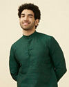 alt message - Manyavar Men Moss Green Self Patterned Kurta image number 0