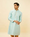 alt message - Manyavar Men Aqua Blue Shankh Patterned Kurta Set image number 0