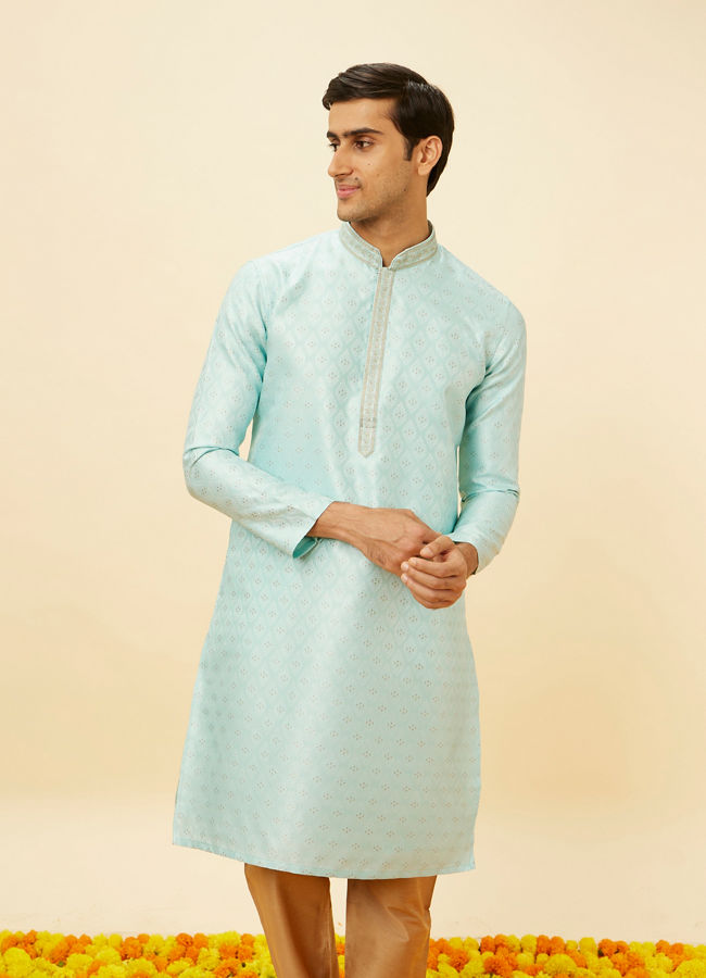 alt message - Manyavar Men Aqua Blue Shankh Patterned Kurta Set image number 0