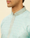 alt message - Manyavar Men Aqua Blue Shankh Patterned Kurta Set image number 1