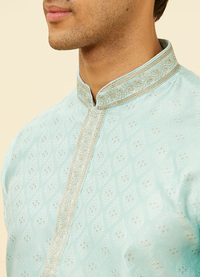 alt message - Manyavar Men Aqua Blue Shankh Patterned Kurta Set image number 1