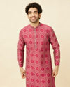 alt message - Manyavar Men Ruby Pink Harlequin Printed Kurta Set image number 0