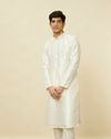 alt message - Manyavar Men Soft Cream Bandhgala Neckline Kurta Set image number 0