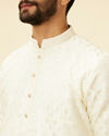 alt message - Manyavar Men Cream Diamond String Patterned Kurta Set image number 1