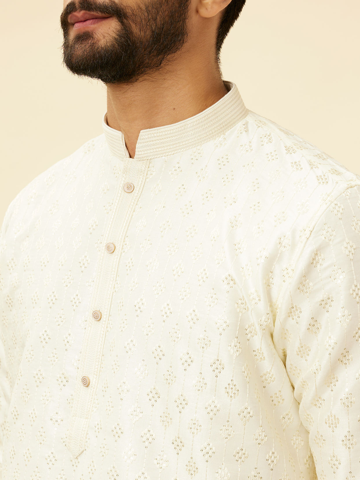 alt message - Manyavar Men Cream Diamond String Patterned Kurta Set image number 1