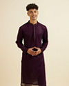 alt message - Manyavar Men Purple Self Patterned Mirror Work Kurta Set image number 0