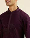 alt message - Manyavar Men Purple Self Patterned Mirror Work Kurta Set image number 1