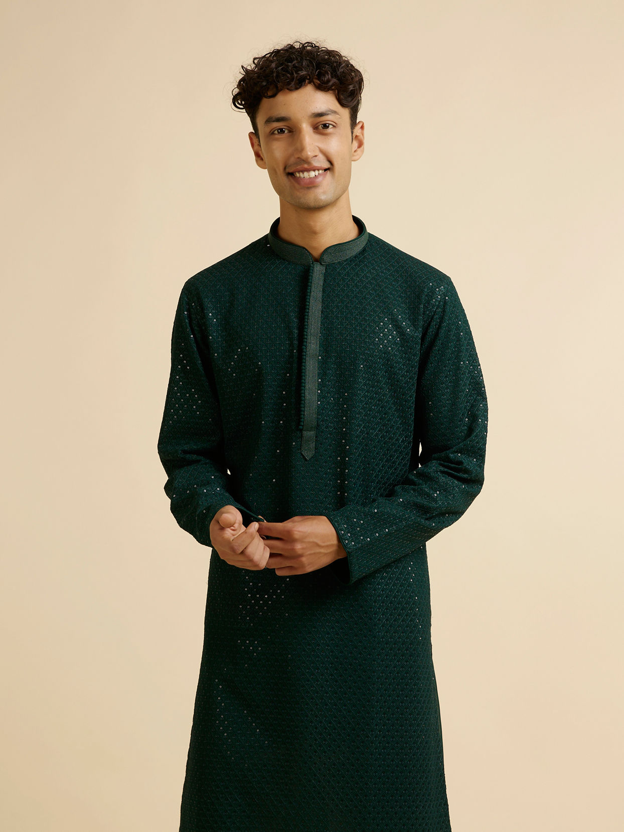 alt message - Manyavar Men Dark Green Self Patterned Mirror Work Kurta Set image number 0