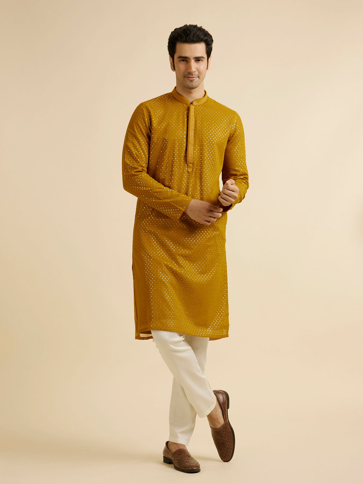 alt message - Manyavar Men Mustard Self Patterned Mirror Work Kurta Set image number 2