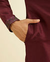 Manyavar Men Wine Red Plain Classic Kurta Set with Embroidered Neckline