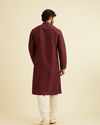 Manyavar Men Wine Red Plain Classic Kurta Set with Embroidered Neckline