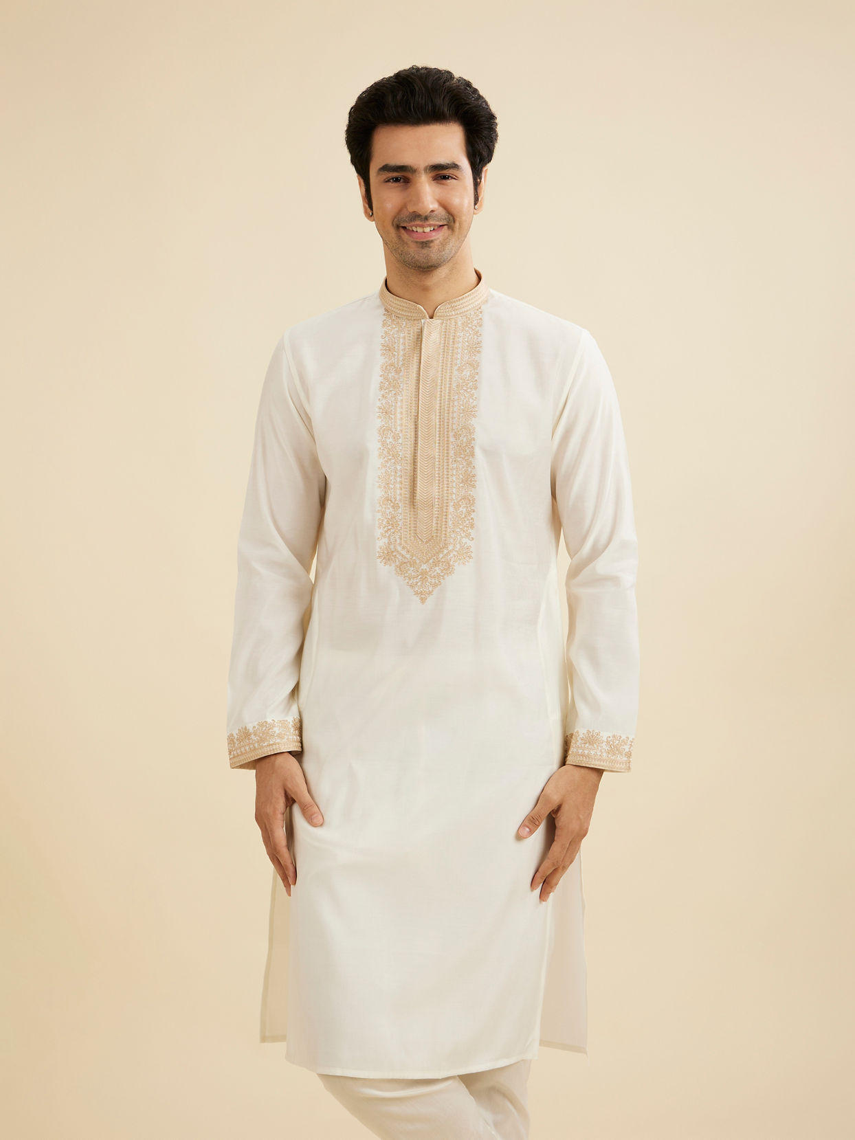 Manyavar Men Warm White Kurta Set with Bel Buti Embroidered Neckline