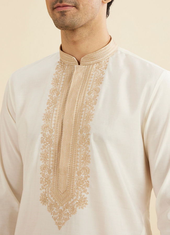 Manyavar Men Warm White Kurta Set with Bel Buti Embroidered Neckline
