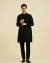 Manyavar Men Elegant Black Ensemble Kurta Churidar
