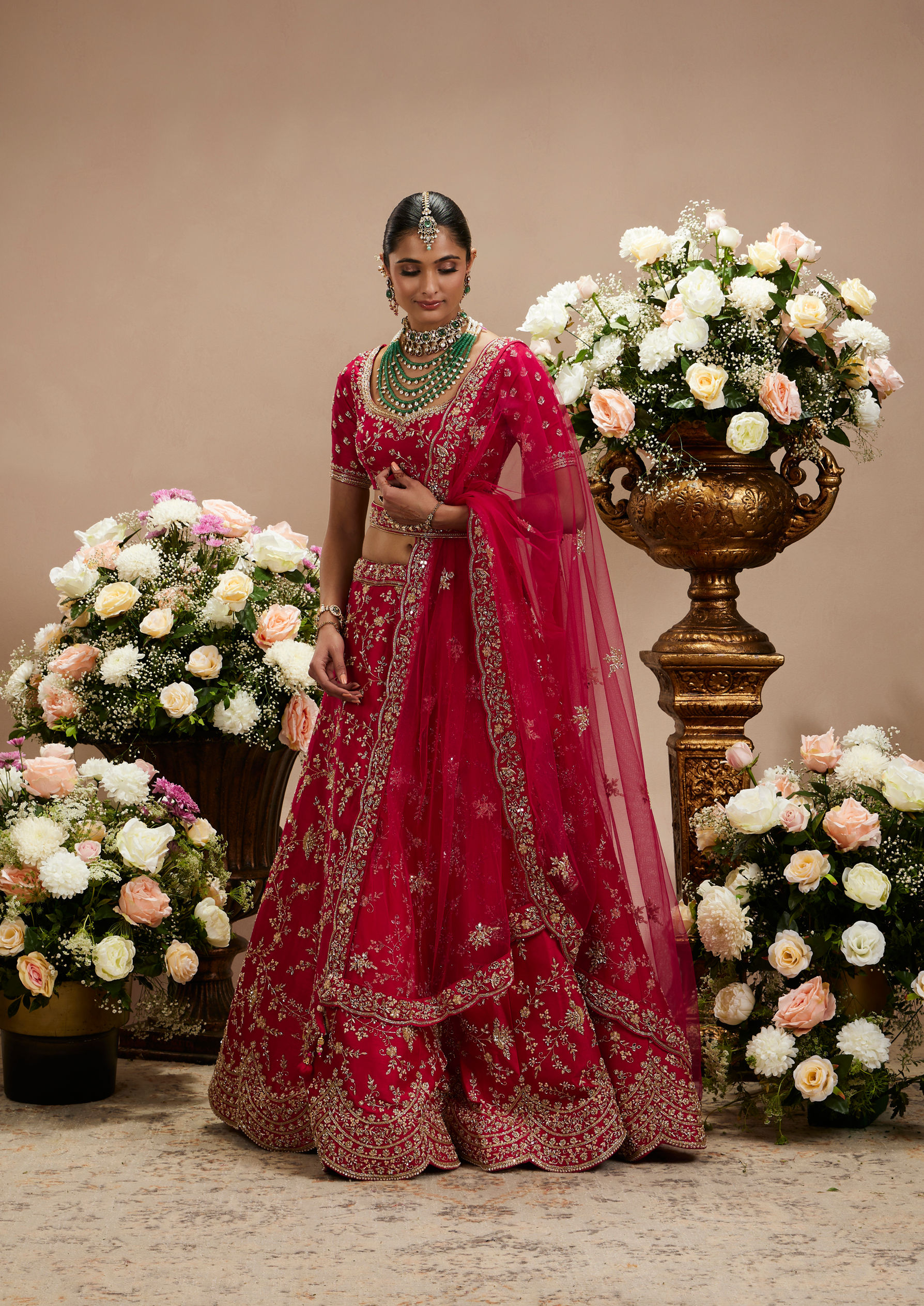 Twamev Women Rani Pink Bel Buti Embroidered Lehenga with Scalloped Borders And Pillow Trim Latkans