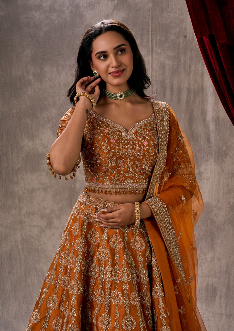 Twamev Women Twirling Orange Saga Lehenga