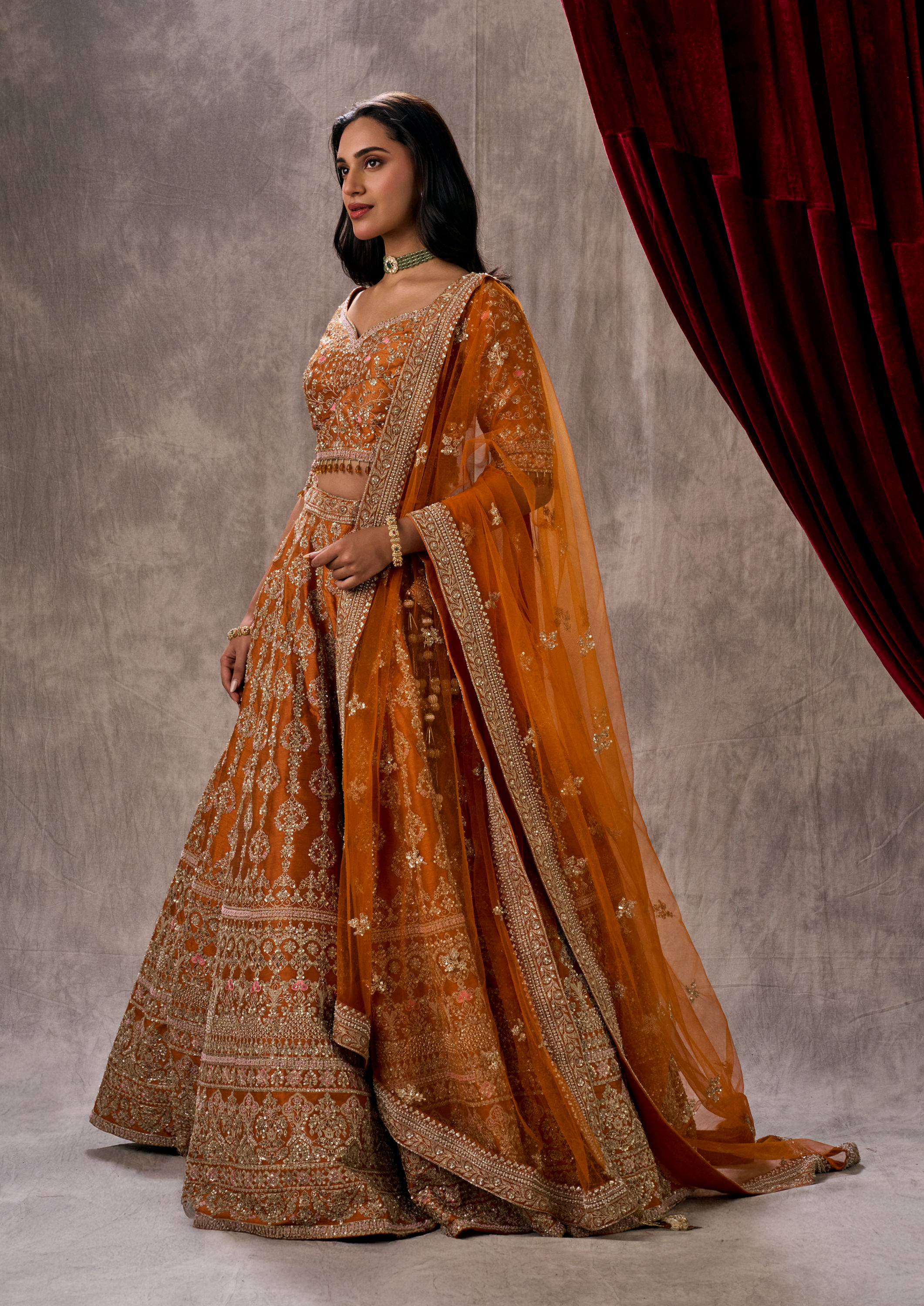Twamev Women Twirling Orange Saga Lehenga