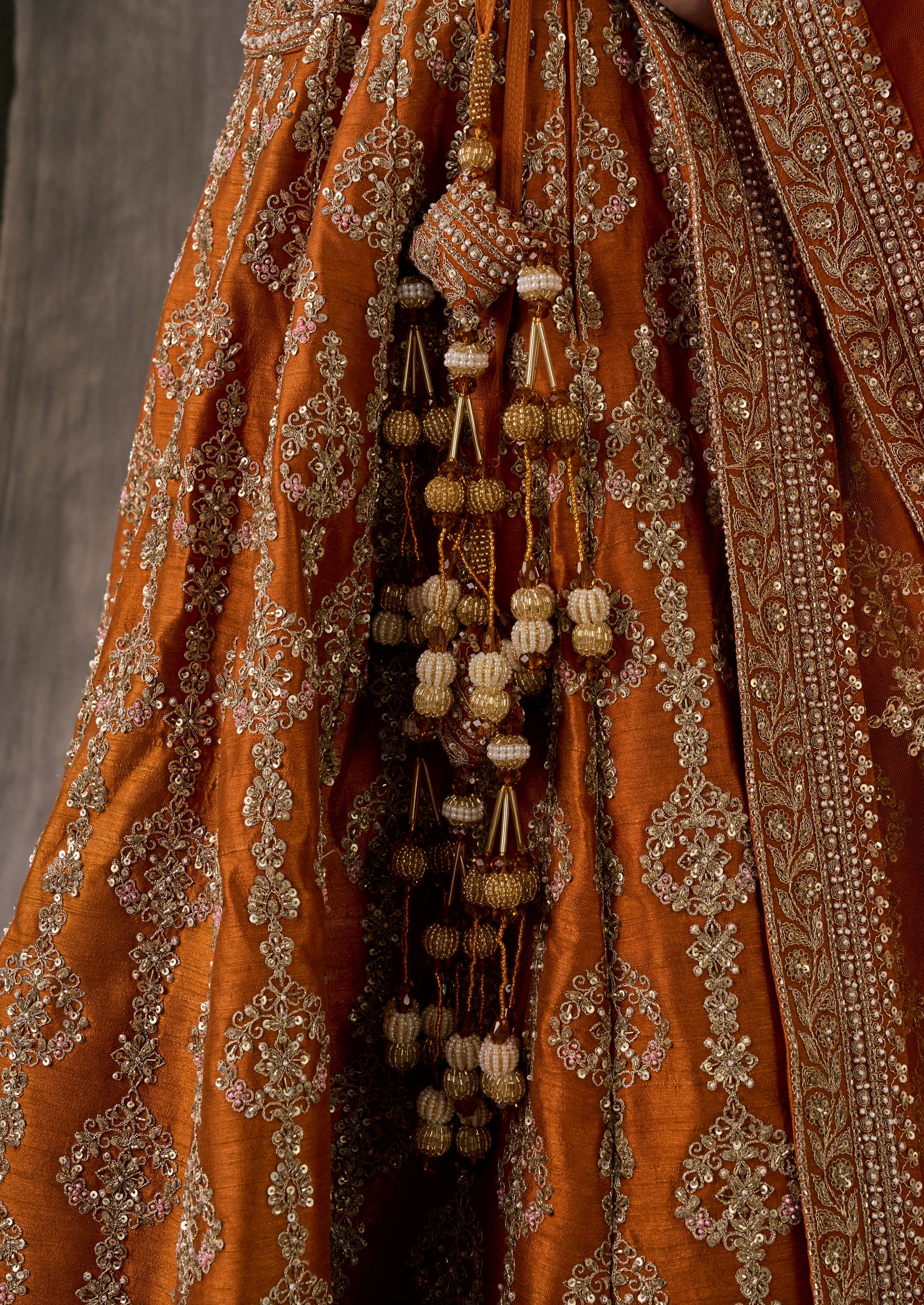 Twamev Women Twirling Orange Saga Lehenga