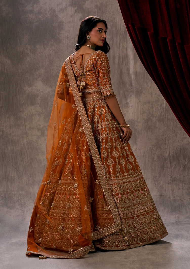 Twamev Women Twirling Orange Saga Lehenga
