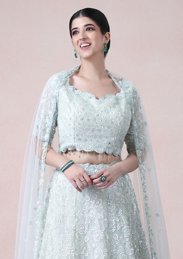 alt message - Twamev Women Serene Sea Green Lehenga image number 1