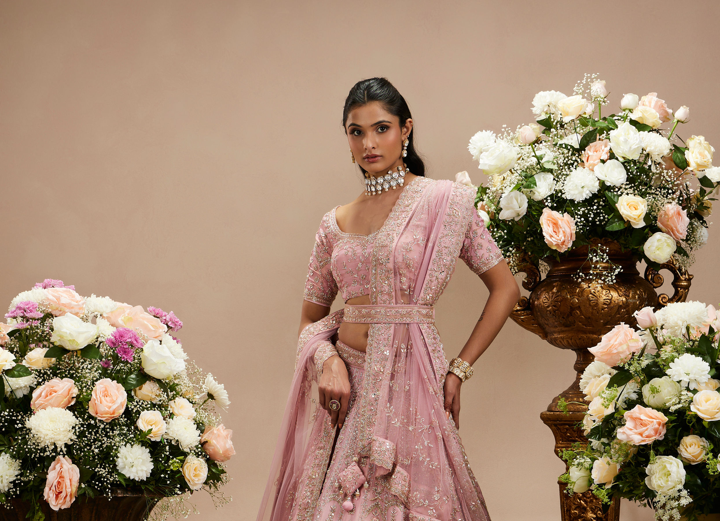 Twamev Women Baby Pink Zari Embroidered Lehenga with Floral And Buta Motifs And Pillow Trim Latkans