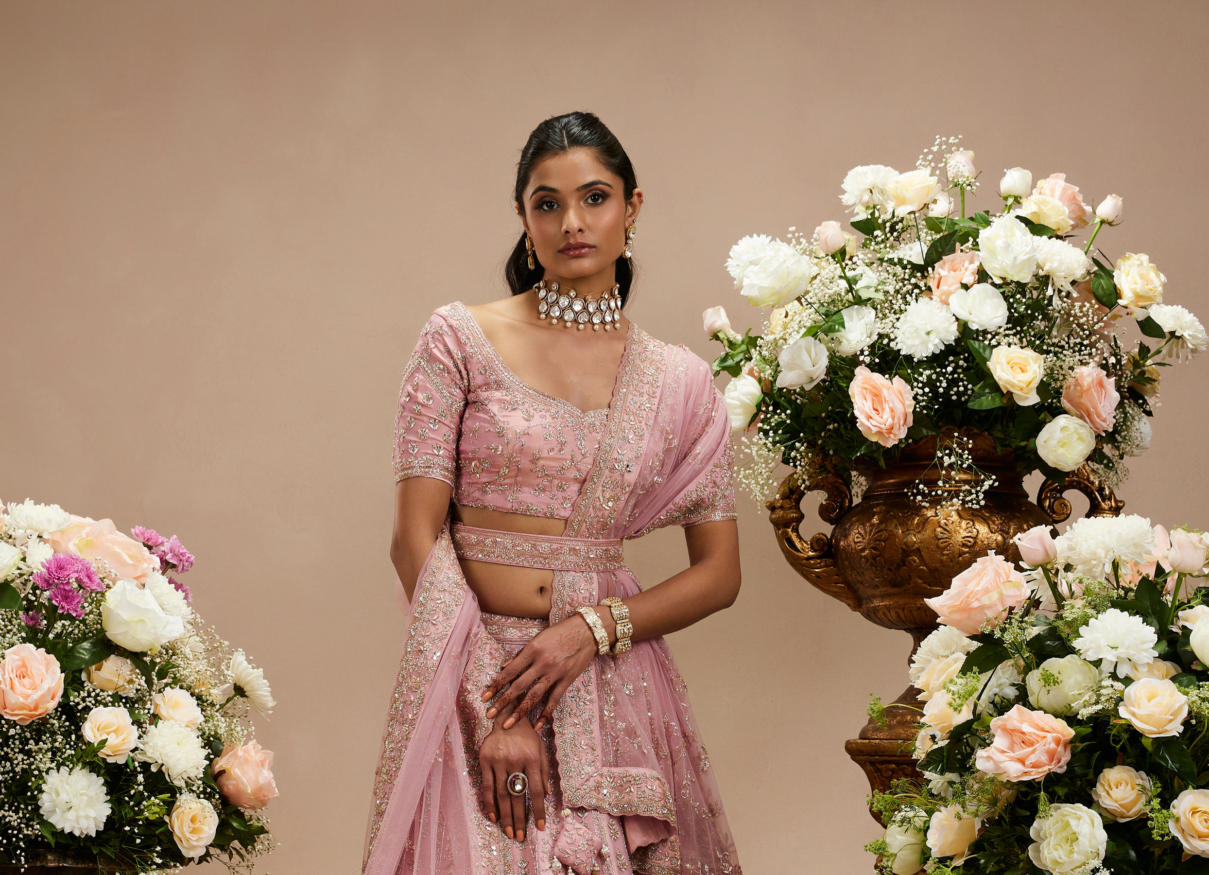 Twamev Women Baby Pink Zari Embroidered Lehenga with Floral And Buta Motifs And Pillow Trim Latkans