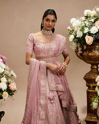 Twamev Women Baby Pink Zari Embroidered Lehenga with Floral And Buta Motifs And Pillow Trim Latkans