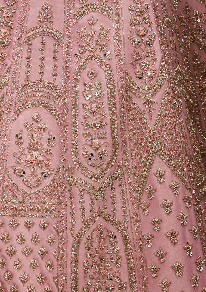 Twamev Women Baby Pink Zari Embroidered Lehenga with Floral And Buta Motifs And Pillow Trim Latkans