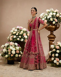 Twamev Women Rani Pink Zari Embroidered Lehenga with Floral And Buta Motifs And Pillow Trim Latkans