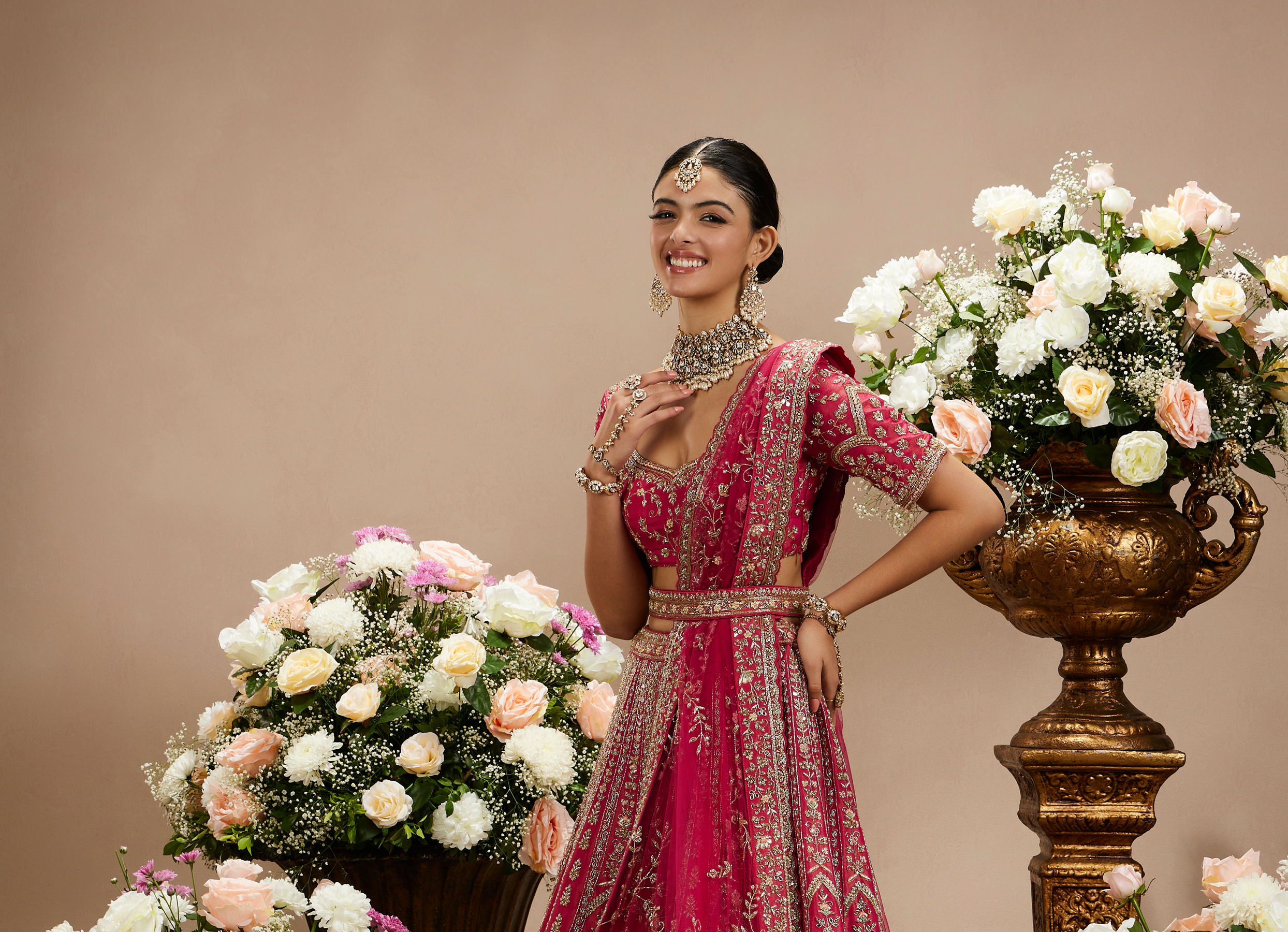 Twamev Women Rani Pink Zari Embroidered Lehenga with Floral And Buta Motifs And Pillow Trim Latkans