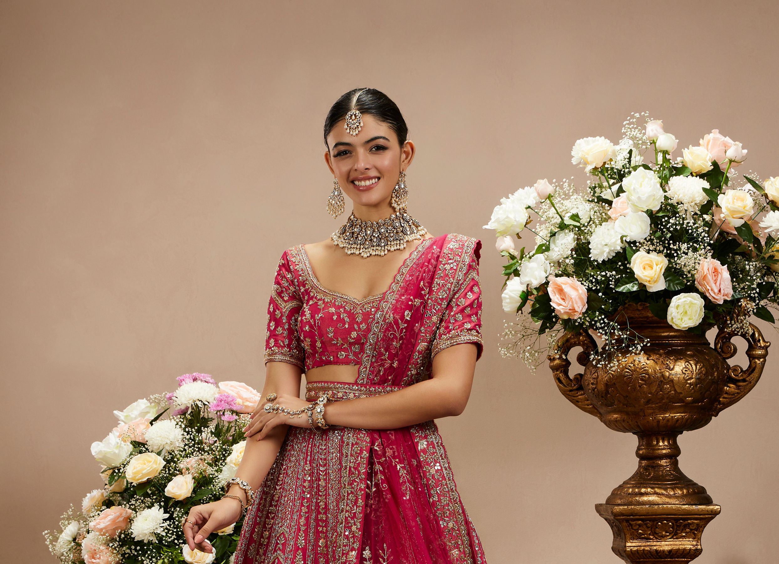 Twamev Women Rani Pink Zari Embroidered Lehenga with Floral And Buta Motifs And Pillow Trim Latkans