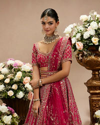 Twamev Women Rani Pink Zari Embroidered Lehenga with Floral And Buta Motifs And Pillow Trim Latkans