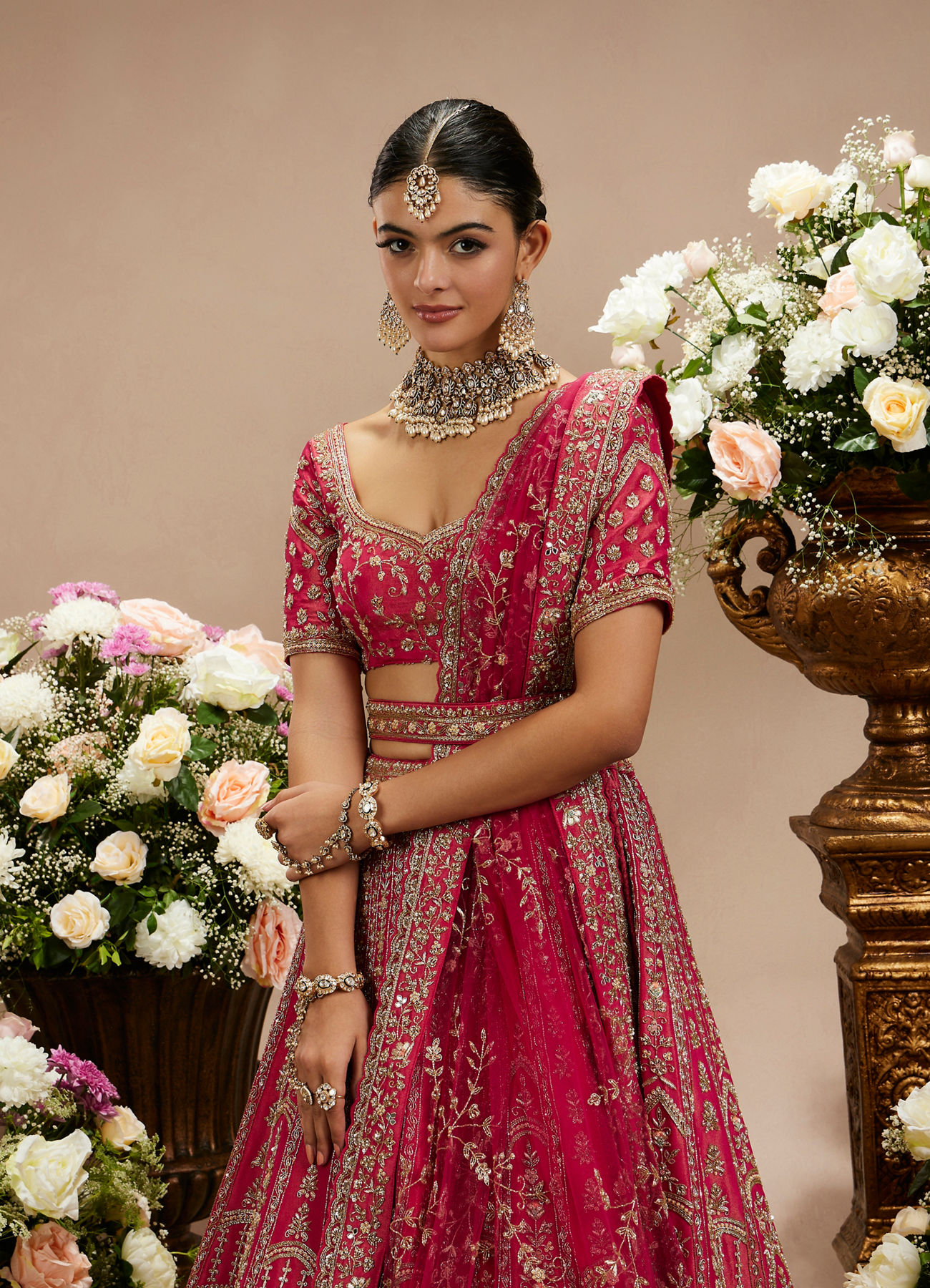 Twamev Women Rani Pink Zari Embroidered Lehenga with Floral And Buta Motifs And Pillow Trim Latkans