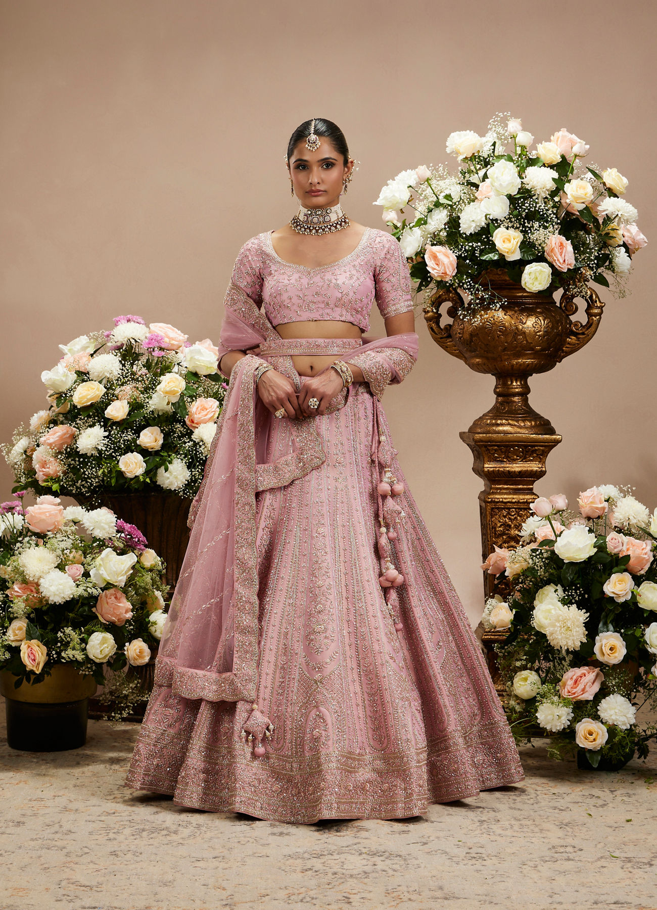 Twamev Women Dusty Pink Floral Embroidered Lehenga with Darbar, Floral Buta Motifs And Tassel Trims