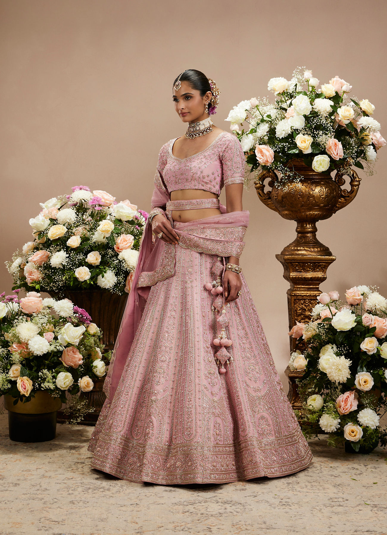 Twamev Women Dusty Pink Floral Embroidered Lehenga with Darbar, Floral Buta Motifs And Tassel Trims