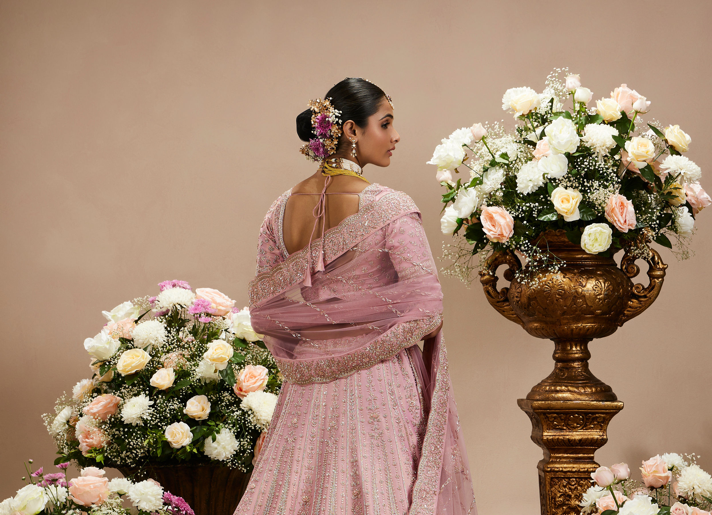 Twamev Women Dusty Pink Floral Embroidered Lehenga with Darbar, Floral Buta Motifs And Tassel Trims