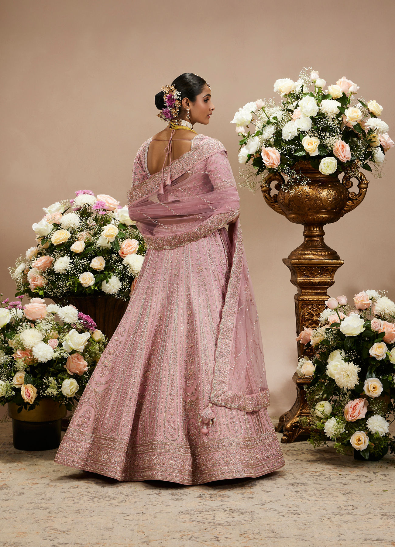 Twamev Women Dusty Pink Floral Embroidered Lehenga with Darbar, Floral Buta Motifs And Tassel Trims
