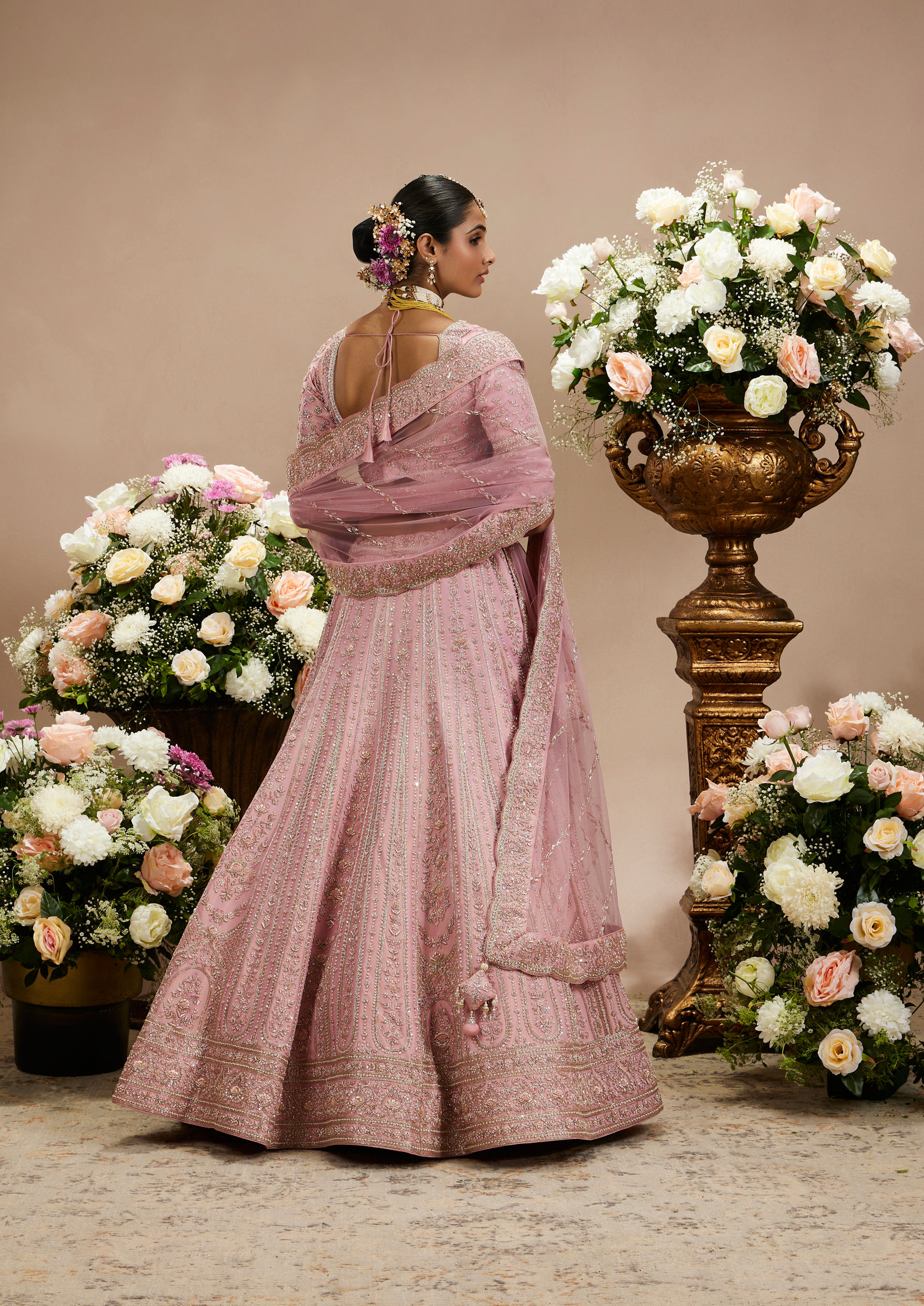 Twamev Women Dusty Pink Floral Embroidered Lehenga with Darbar, Floral Buta Motifs And Tassel Trims