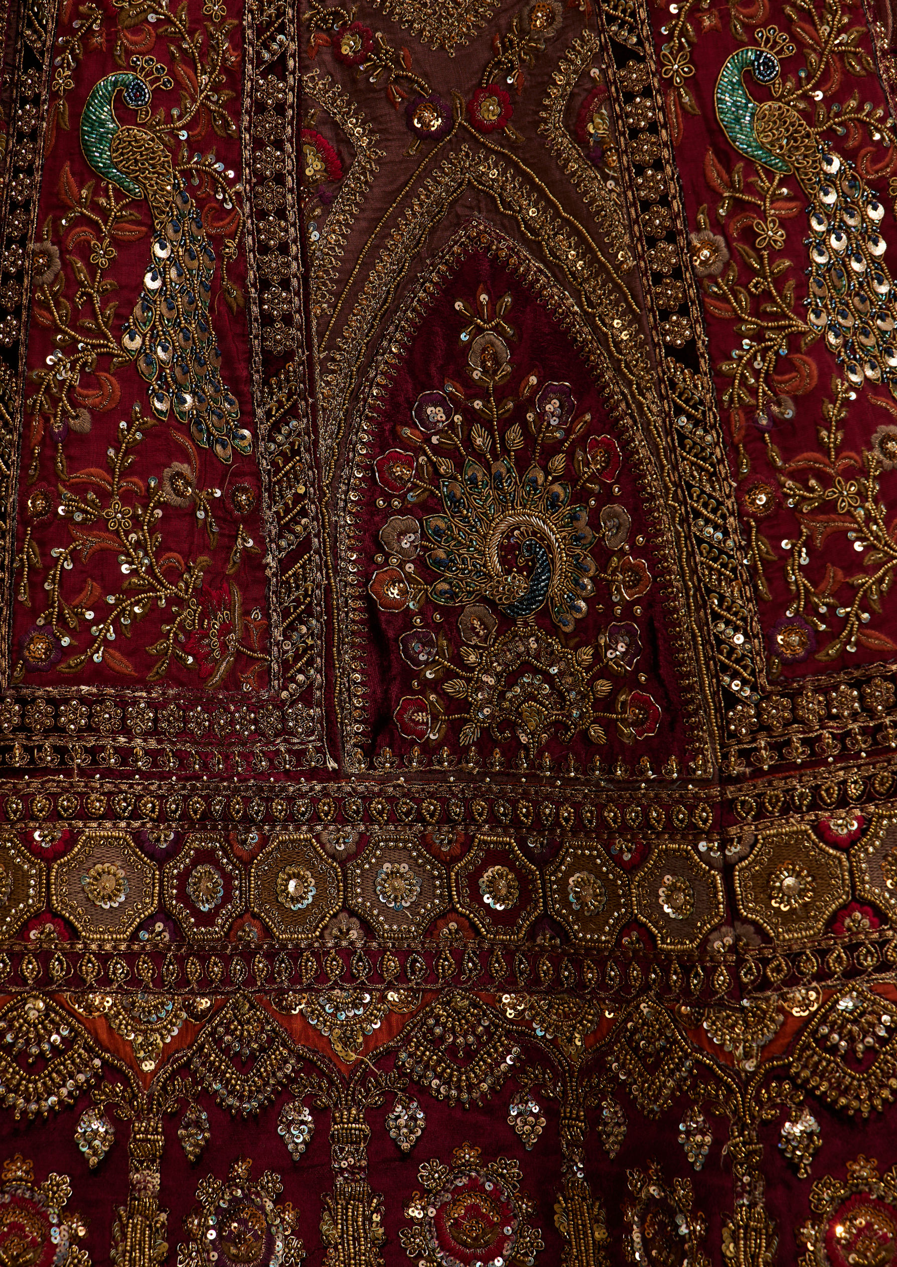 Twamev Women Maroon Red Jhallar Patterned Lehenga with Peacock And Pillow Trim Latkans