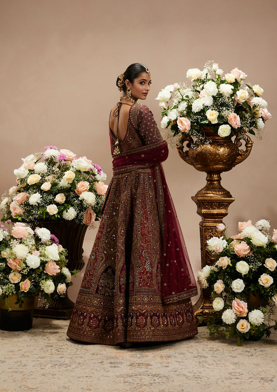 Twamev Women Maroon Red Jhallar Patterned Lehenga with Peacock And Pillow Trim Latkans