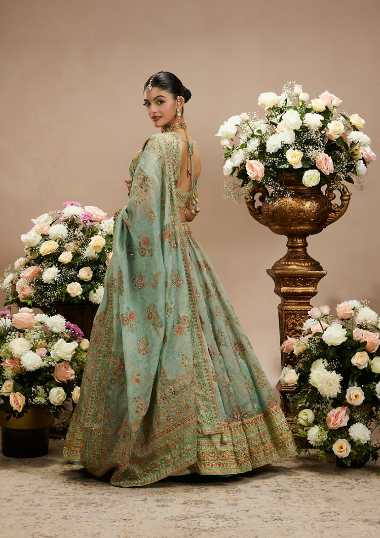 Twamev Women Sea Green Floral Embroidered Lehenga with Mirror Work And Tassled Blouse