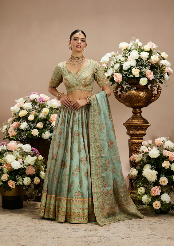 Twamev Women Sea Green Floral Embroidered Lehenga with Mirror Work And Tassled Blouse