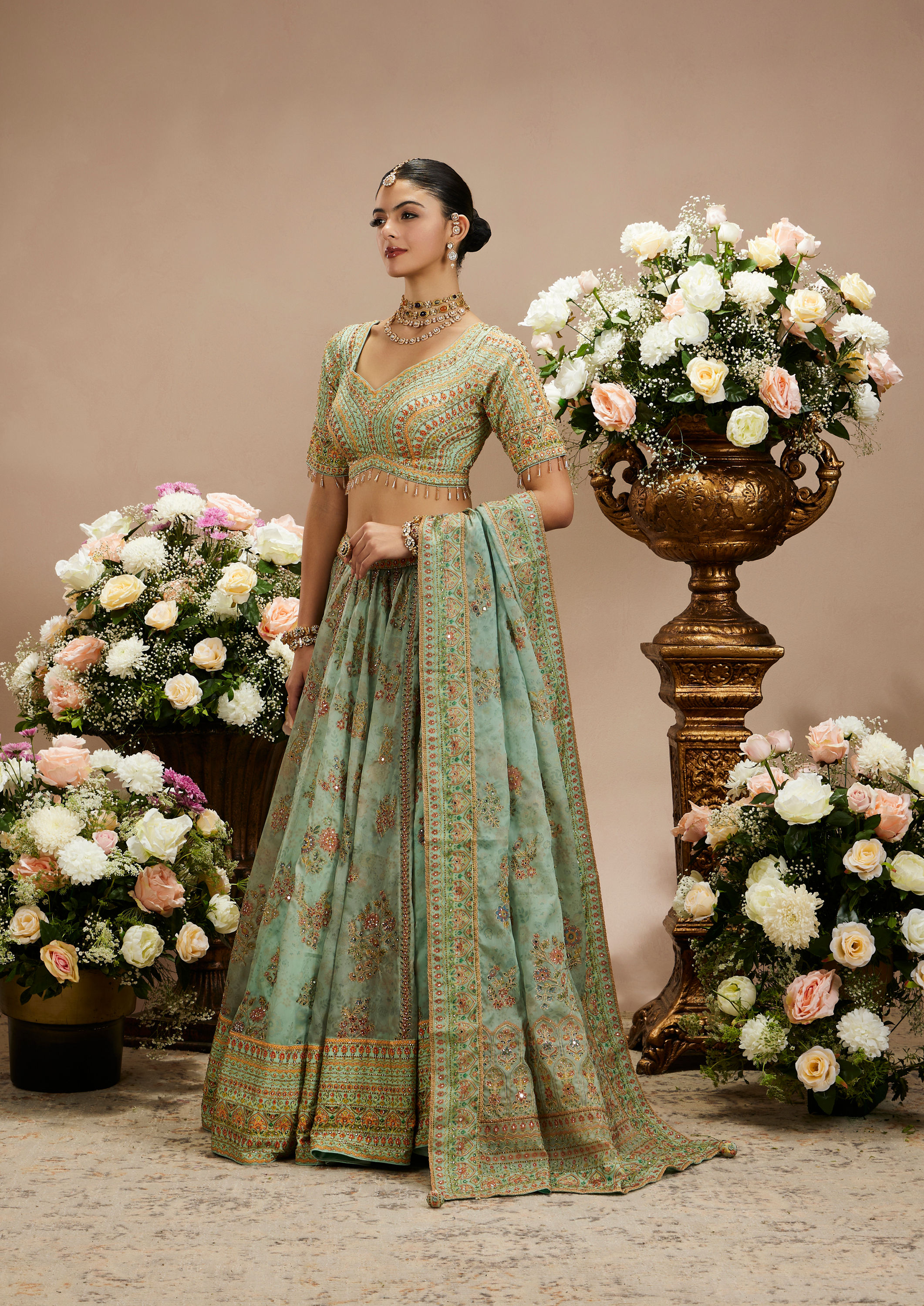 Twamev Women Sea Green Floral Embroidered Lehenga with Mirror Work And Tassled Blouse