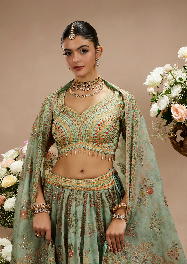 Twamev Women Sea Green Floral Embroidered Lehenga with Mirror Work And Tassled Blouse