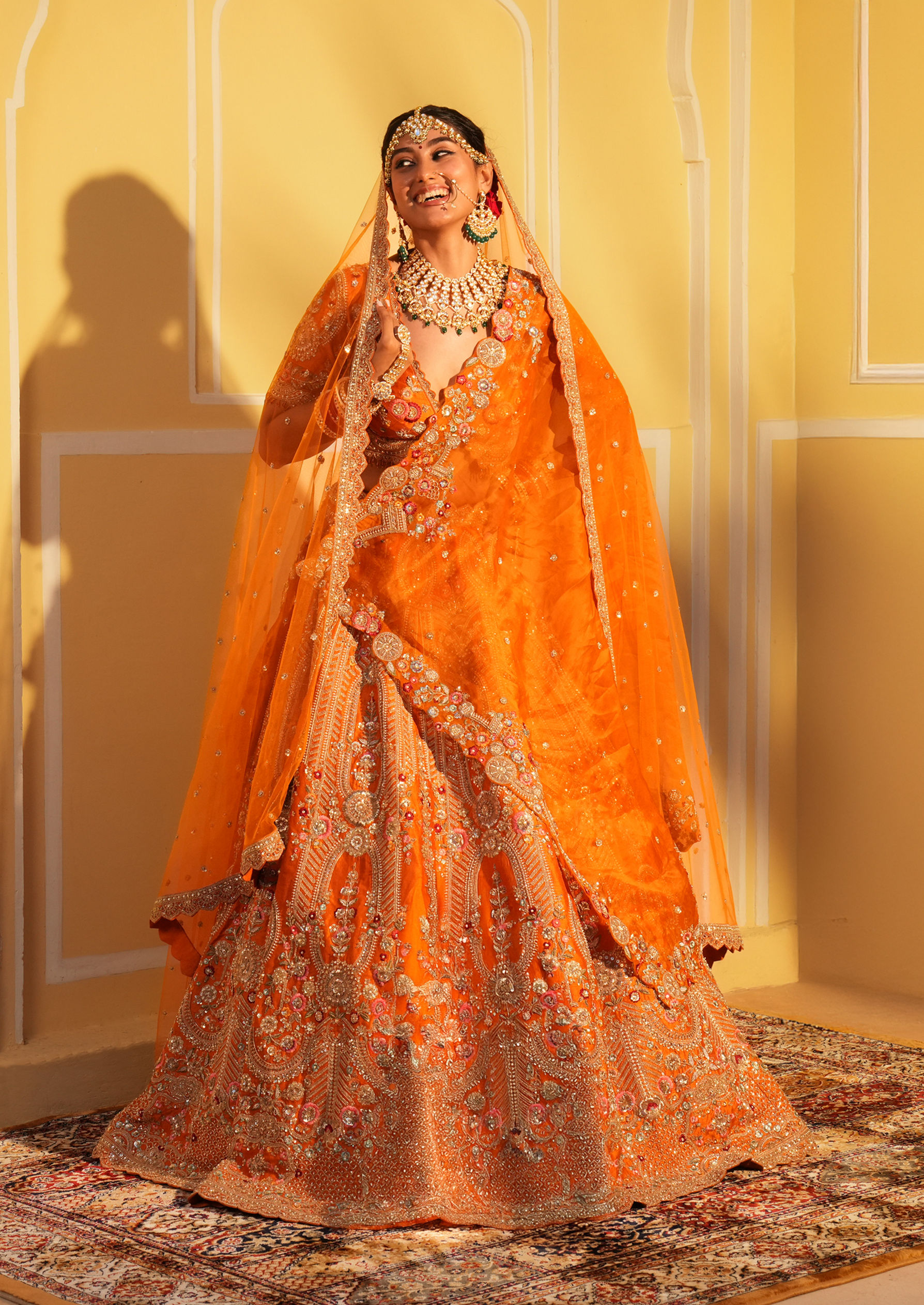 Twamev Women Twinkling Orange Lehenga Spectacle