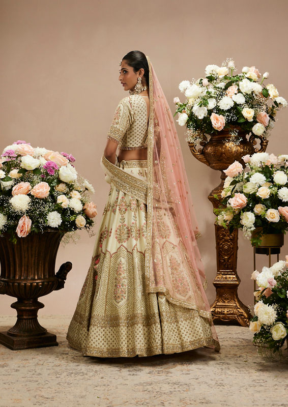 Twamev Women Cream White Jaal Patterned Lehenga with Floral Buta Motifs And Sequin Work