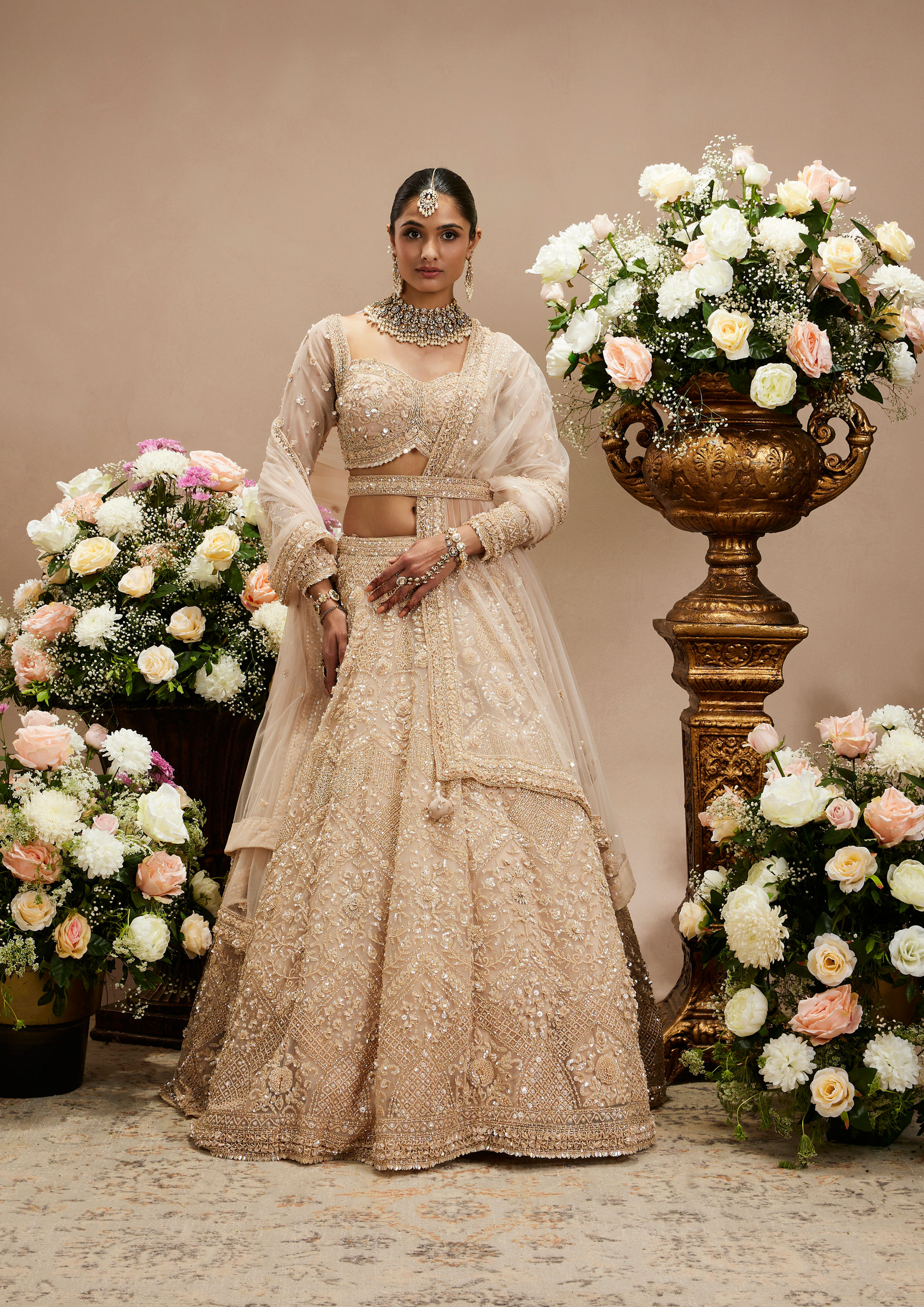 Twamev Women Honey Peach Jaal Patterned Lehenga with Floral Buta Motifs And Sequin And Stone Work