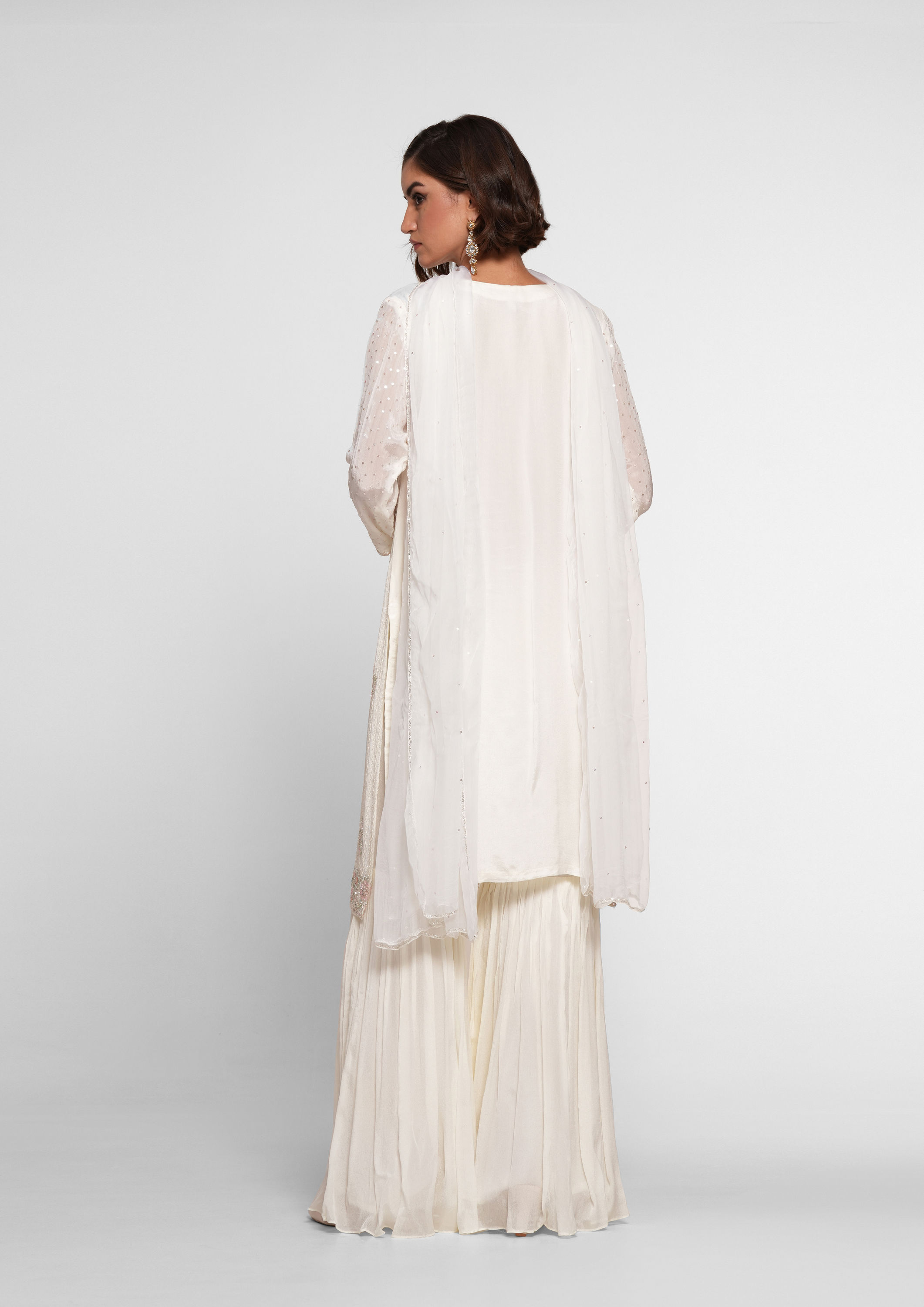 Twamev Women Cream Chinon Stitched Suit with Cutdana Work